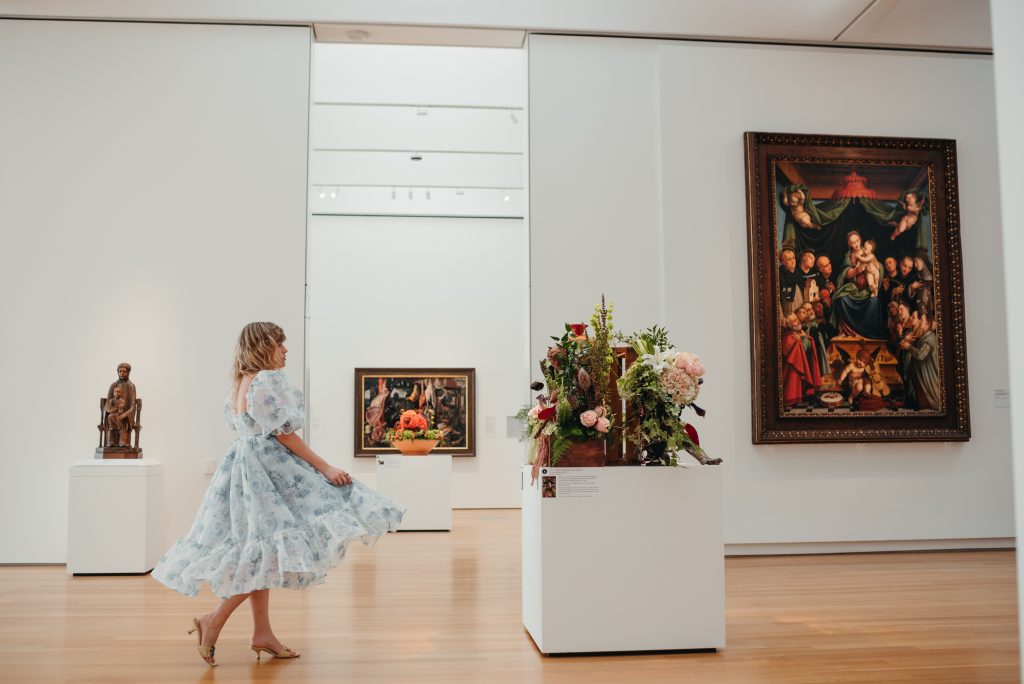 Woman in PNC NCMA Art in Bloom in Selkie La Belle Etoile French Puff Dress