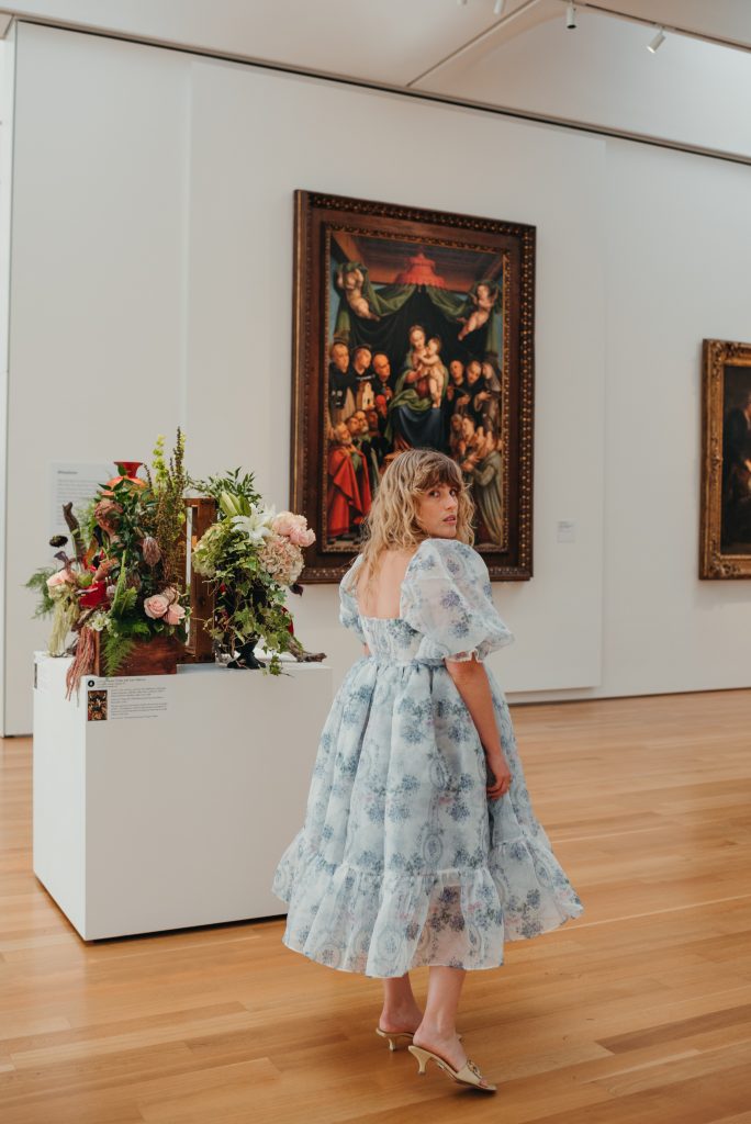 Woman in PNC NCMA Art in Bloom in Selkie La Belle Etoile French Puff Dress