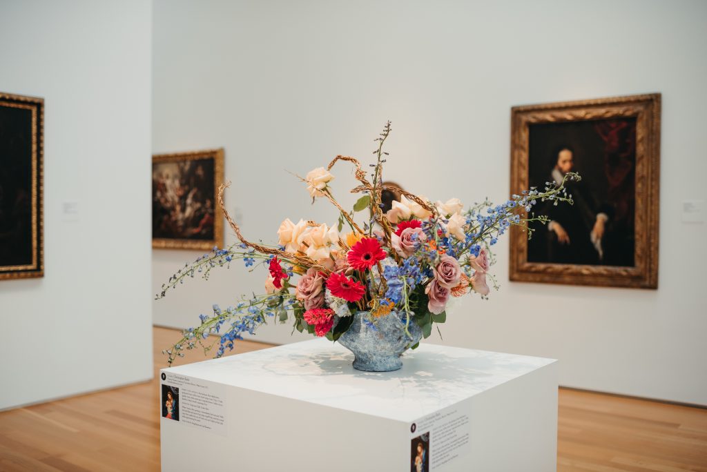 Woman in PNC NCMA Art in Bloom in Selkie La Belle Etoile French Puff Dress