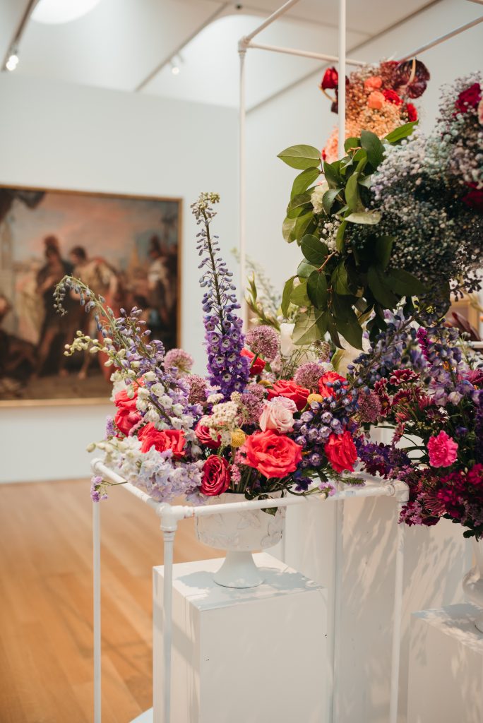 Woman in PNC NCMA Art in Bloom in Selkie La Belle Etoile French Puff Dress