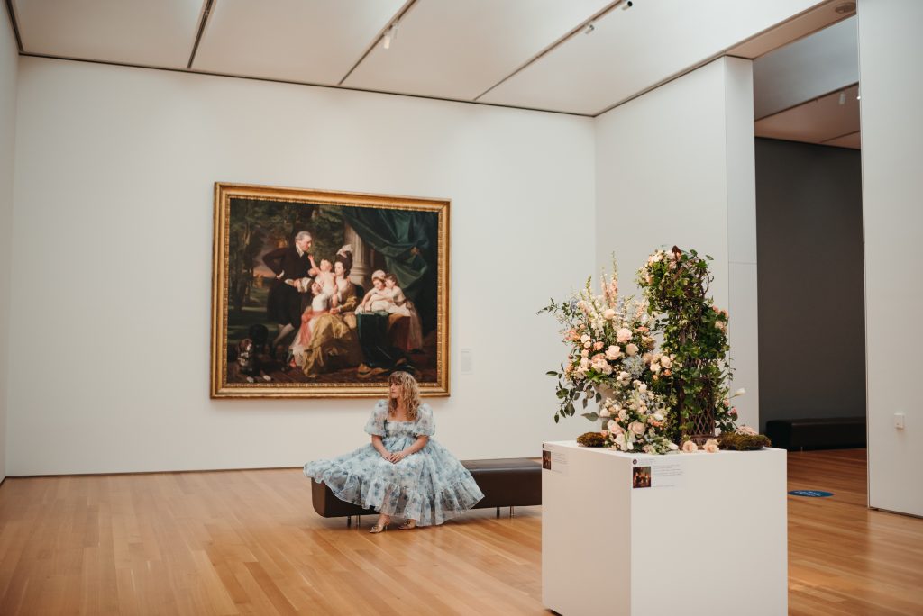 Woman in PNC NCMA Art in Bloom in Selkie La Belle Etoile French Puff Dress