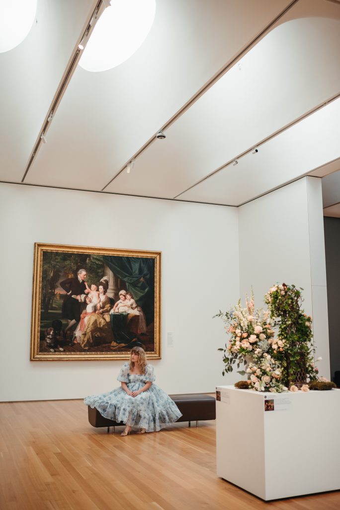 Woman in PNC NCMA Art in Bloom in Selkie La Belle Etoile French Puff Dress