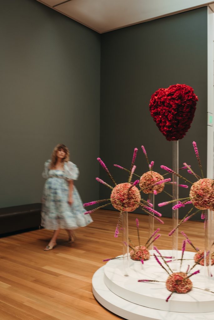 Woman in PNC NCMA Art in Bloom in Selkie La Belle Etoile French Puff Dress