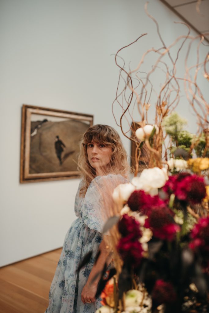 Woman in PNC NCMA Art in Bloom in Selkie La Belle Etoile French Puff Dress