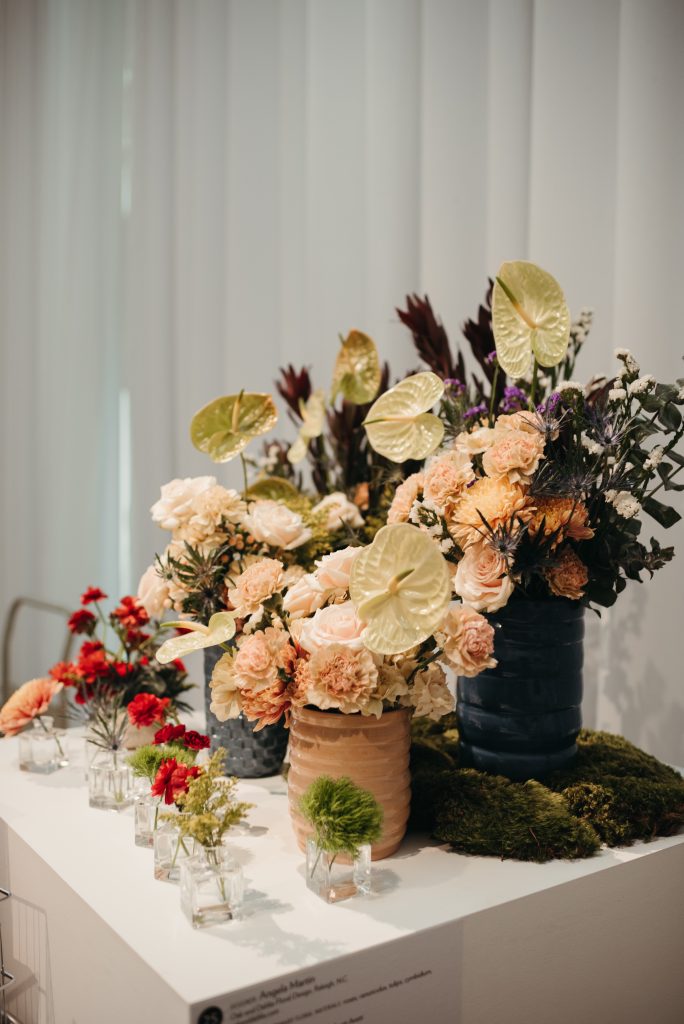 Woman in PNC NCMA Art in Bloom in Selkie La Belle Etoile French Puff Dress